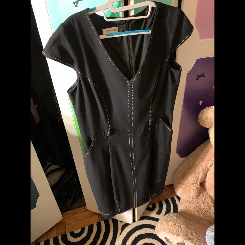 black dress with white stitching